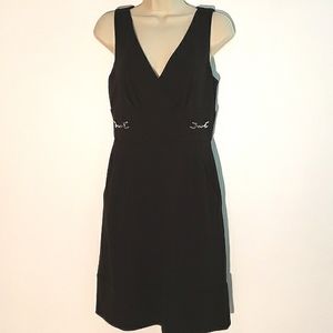White house black market size 6.  Little black dress with pockets.